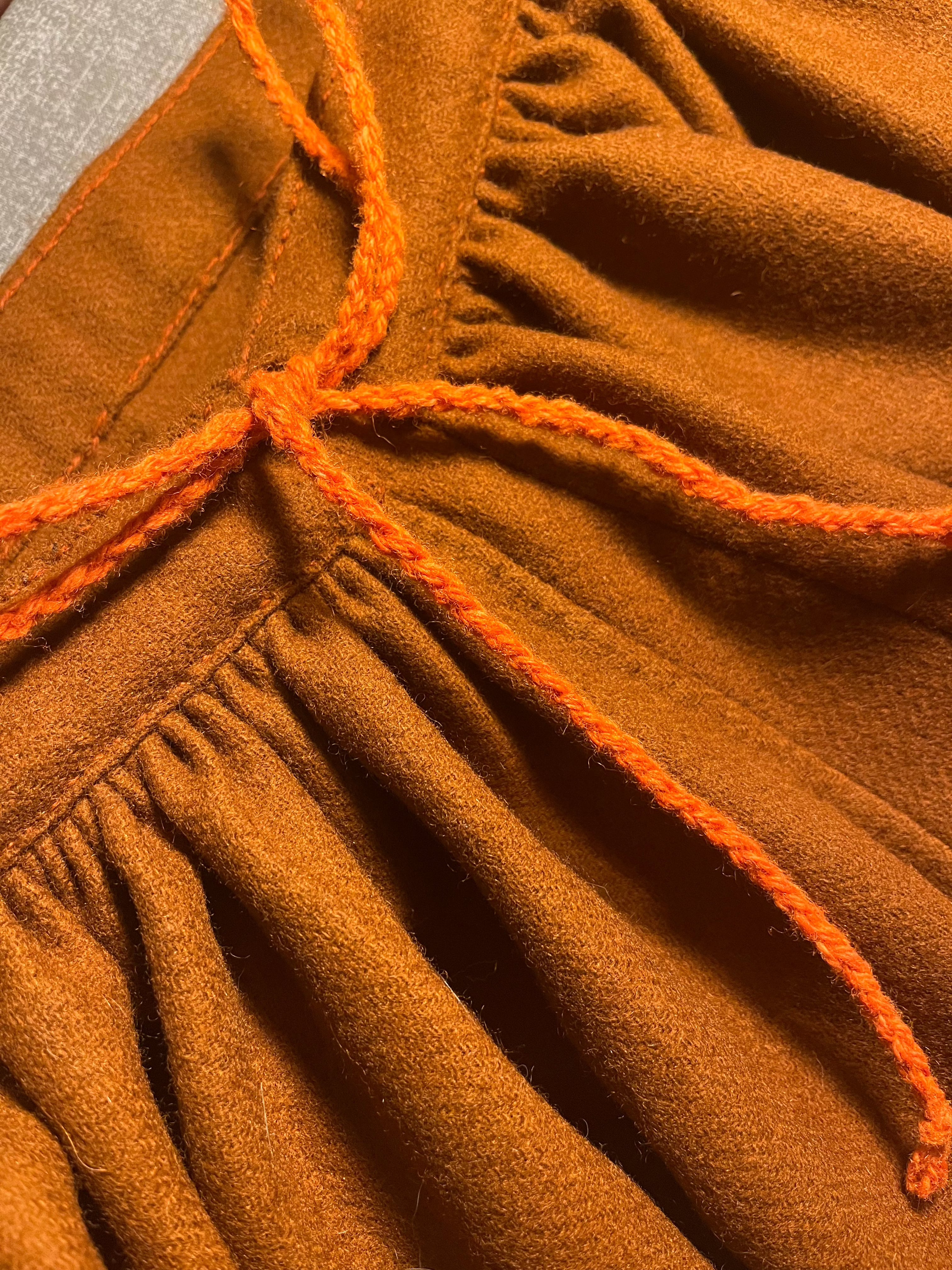 Close-up of Viking Age Hedeby pants with orange drawstring