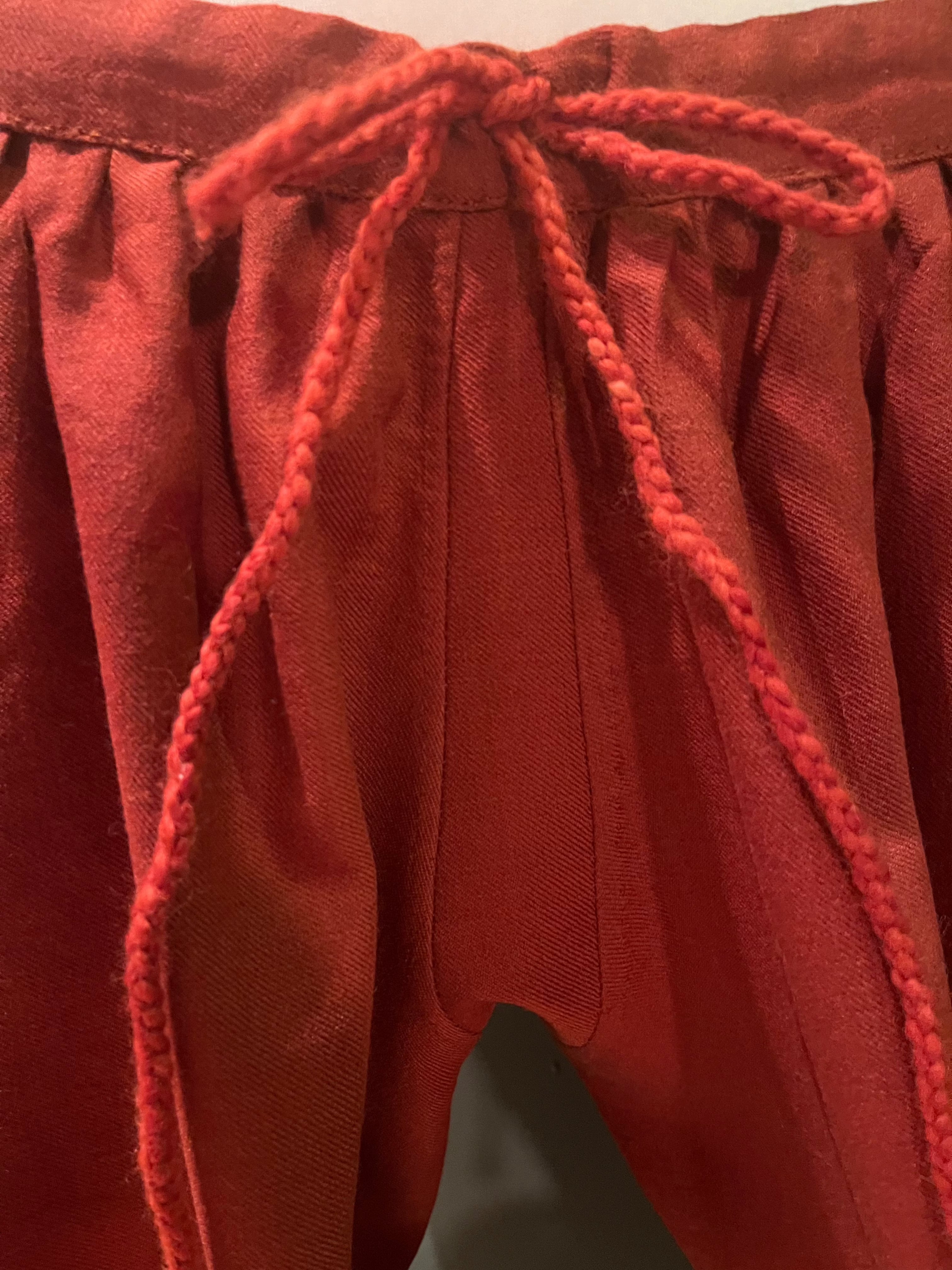 Detail of drawstring on red Viking Hedeby pants