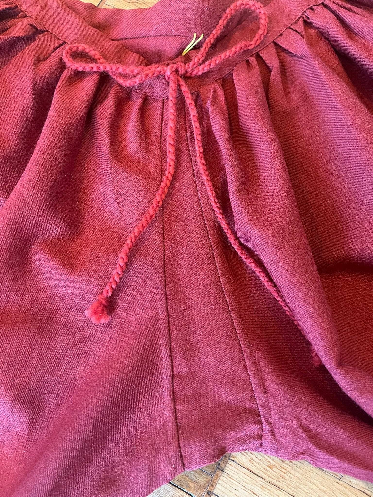 Close-up of waistband on red Viking pants